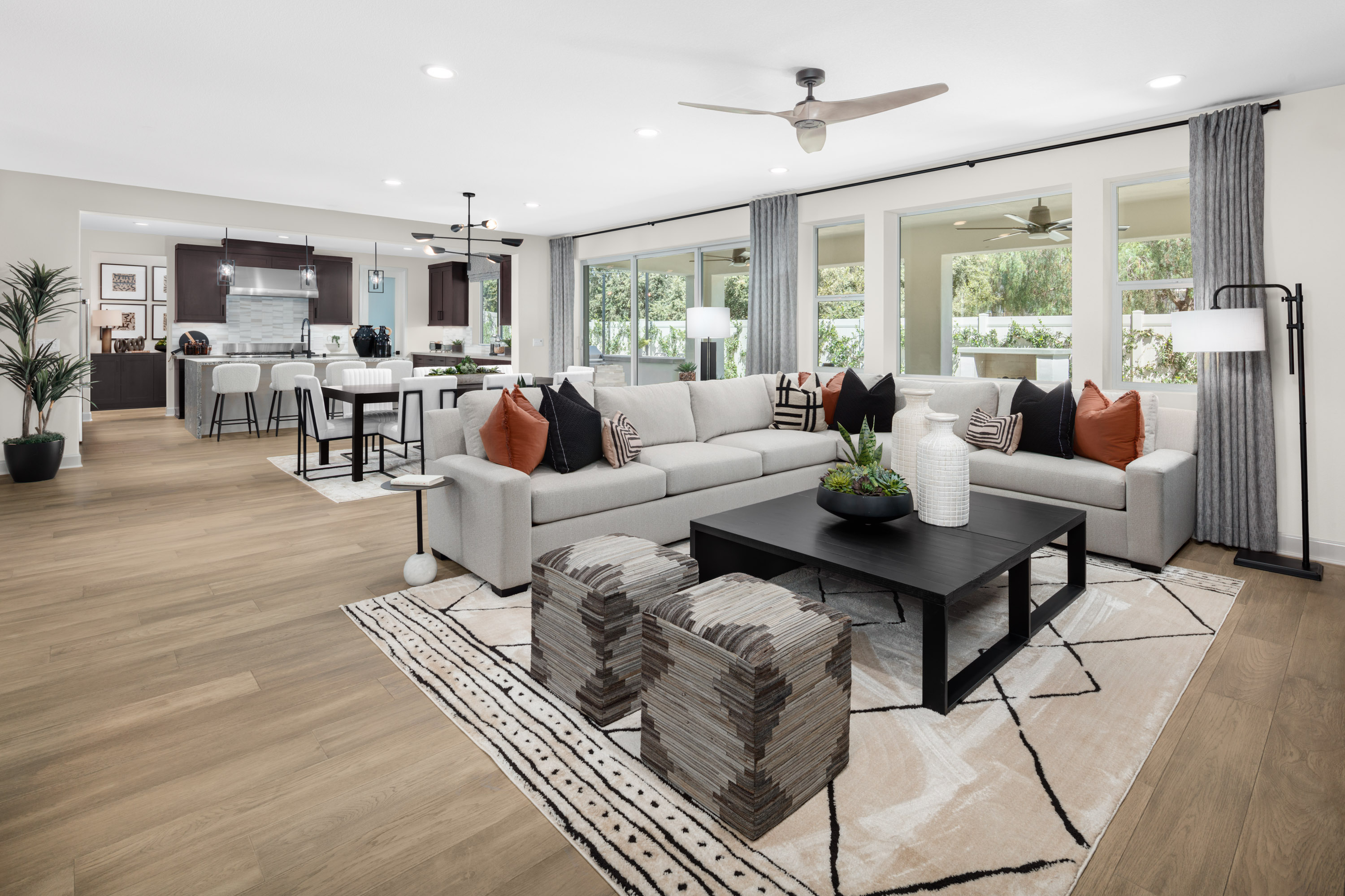 open living space with floor to ceiling windows and modern design