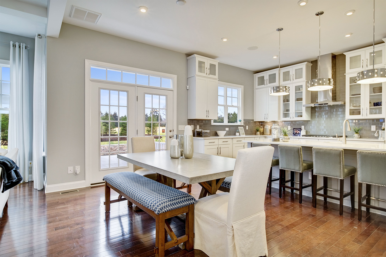 dining area overlooking the outdoor patio and kitchen